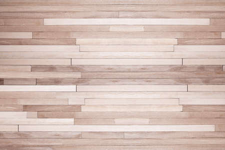 Plank background from small planks of different types of wood top view