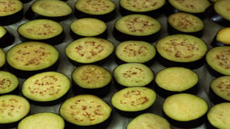 Sliced fresh eggplant slices on a paper towel .Background with healthy foodの写真素材
