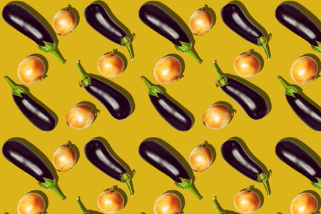 Seamless pattern with fresh eggplant and onion bulbs on a yellow background. Seamless pattern....