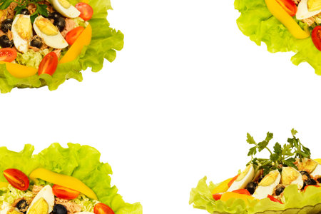 Background decoration fresh vegetables with herbs and tuna meat in a delicious salad with a white background .Delicious healthy saladの写真素材