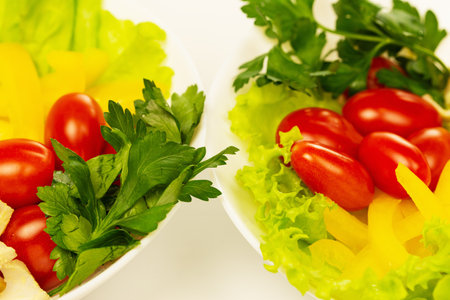 Vegetable - tomato, cucumber, pepper isolated on white backgroundの写真素材