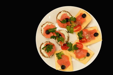 Sandwiches with salmon meat in a white top view plateの写真素材
