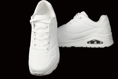 White women's sneakers for active training in different anglesの写真素材