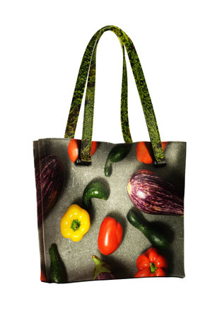 shopping bags set in womans hand isolated on whiteの写真素材