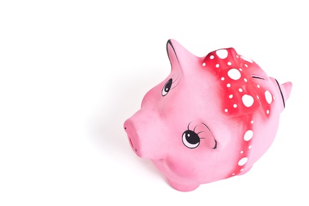 Above side shot of the cute piggy ceramics moneybox on white backgroundの写真素材