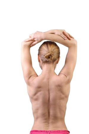 Woman muscular back isolated on white backgroundの写真素材