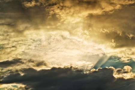 Beautiful morning sunlight through cloudの写真素材