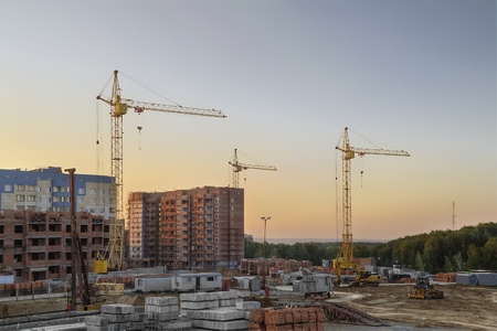 The construction of new apartment houses in Koltsovo town  Russia, Novosibirsk region の写真素材