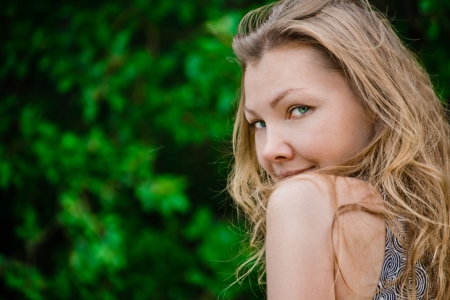 Portrait of beautiful young woman in summer dayの写真素材
