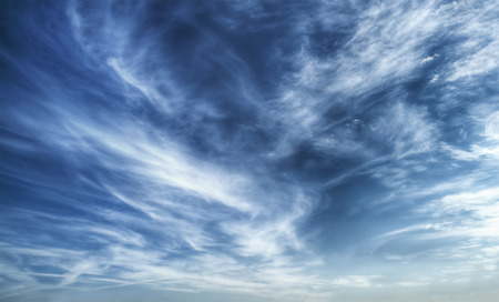 Texture of bright blue dramatic cloudy skyの写真素材