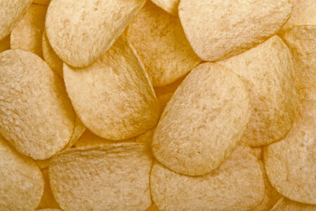 Pile of potato chips - close-up shotの写真素材