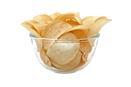 Full bowl with potato chips isolated on white backgroundの写真素材