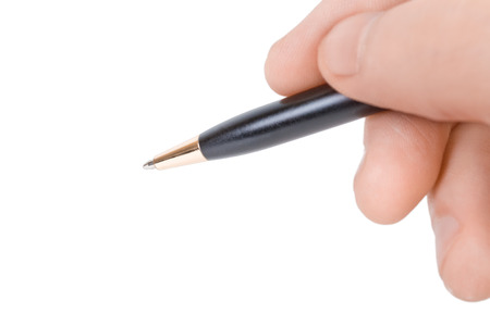 Close-up shot of hand holding pen - isolated on white backgroundの写真素材