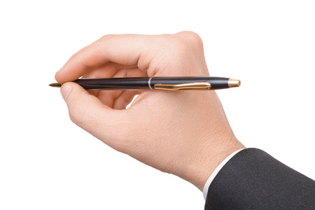 Close-up shot of hand holding pen - isolated on white backgroundの写真素材