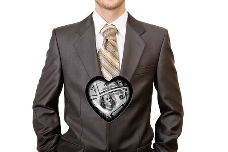 Man in black suit with one hundred dollar heart inside him - isolated on white backgroundの写真素材
