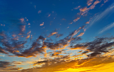 Texture of bright evening cloudy sky during sunsetの写真素材