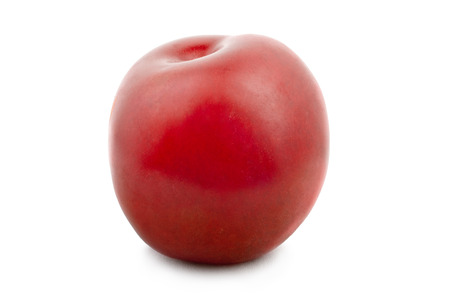 Red plum isolated on white backgroundの写真素材