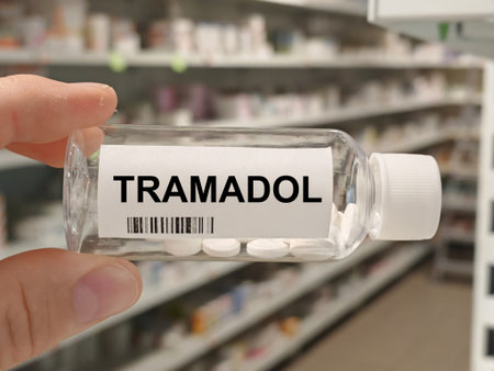 Box of TRAMADOL tablets on a hospital pharmacy table used to treat moderate to severe pain and an opioid analgesic.の写真素材