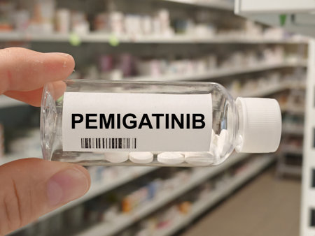 Box of pemigatinib tablets on a hospital pharmacy table used to treat cholangiocarcinoma and FGFR2...