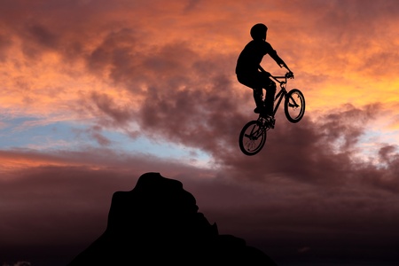 Silhouette at the top of the mountainの写真素材