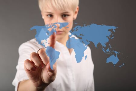 World business connection concept - business woman touching screenの写真素材