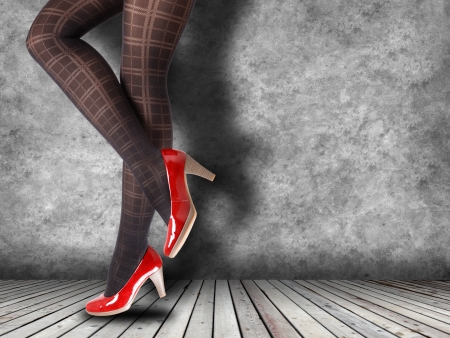 Woman's Legs Wearing Pantyhose and High Heels with space for textの写真素材
