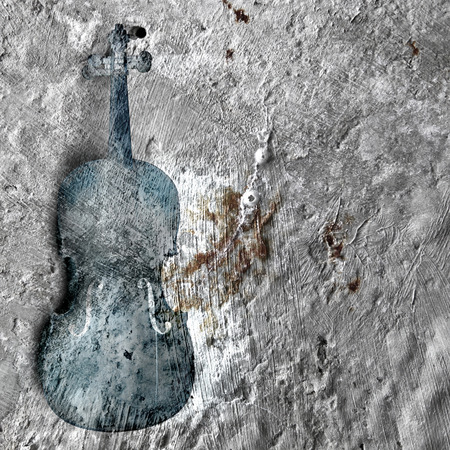 Old broken violin on the rusty backgroundの写真素材