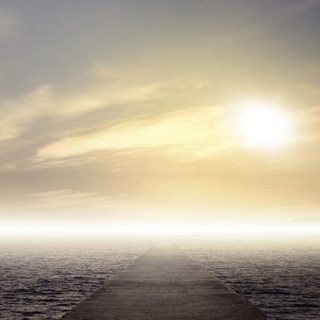 Beautiful sunset with blue sea and sky backgroundの写真素材