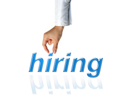 Hand of recruiter advertising for job vacancies, searching candidates to hire for businessの写真素材