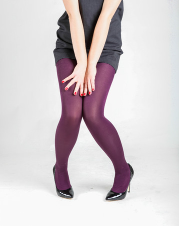 Woman's Legs Wearing Pantyhose and High Heels with space for textの写真素材