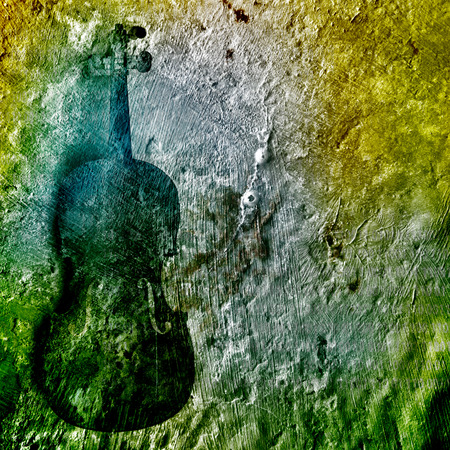 Old broken violin on the rusty backgroundの写真素材