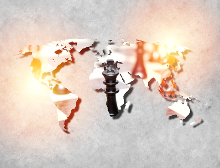 chess figures - strategy and leadership concept at world map textureの写真素材