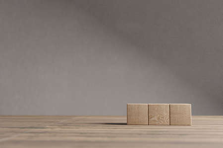 Arranged wood cube stacking as shape, mock up for create symbol or logo, business growth and...