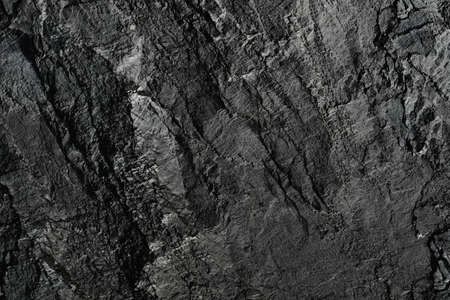 Dark stone or rock texture background. High resolution wall design textureの写真素材