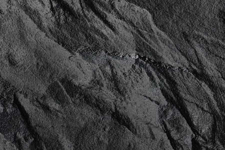 Dark stone or rock texture background. High resolution wall design textureの写真素材