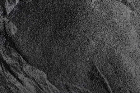 Dark stone or rock texture background. High resolution wall design textureの写真素材