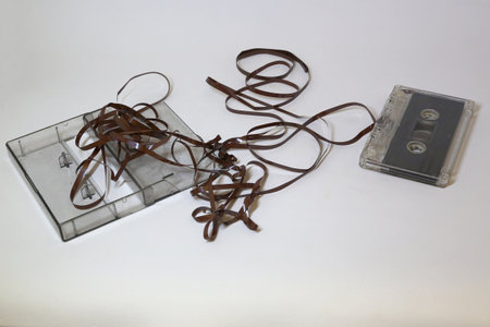 Old audio cassette tape on a white background. Isolated object.