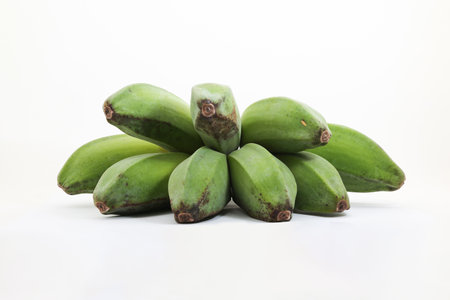 Bunch of green bananas isolated on white background.の写真素材
