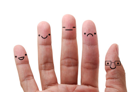 Fingers with smiley faces isolated on white background. Concept of friendshipの写真素材