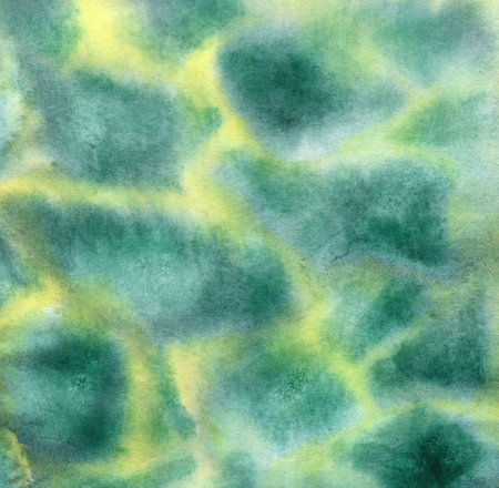 hand made watercolor texture with green spots on the yellow backgroundの写真素材