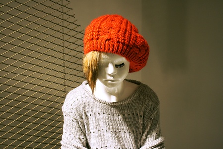 Half-lenght photo of a child mannequin girl in the windowの写真素材
