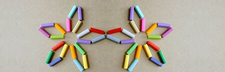 Composition of marker caps in the shape of stylized flowersの写真素材