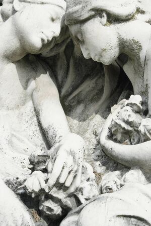 Detail of two beautiful cemetery sculptureの写真素材