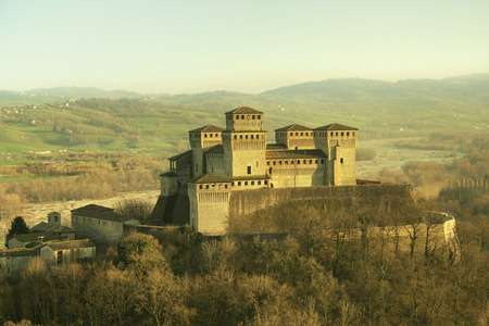 Beautiful view of the medieval castle of Torrechiara, Parma, Italy, at sunsetの写真素材