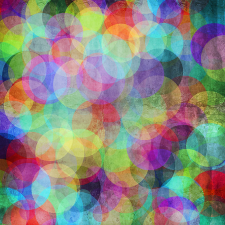 Many vivid color circles on a grunge backgroundの写真素材
