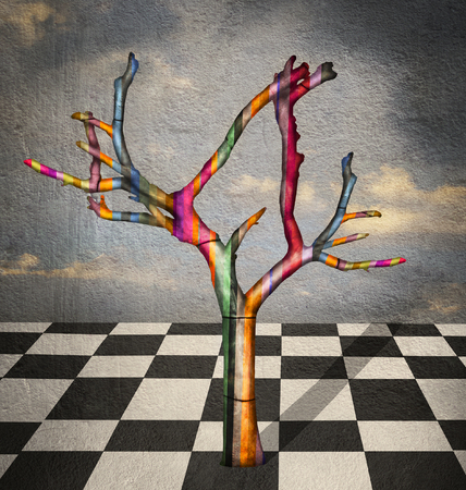Surreal image representing a colorful striped tree in a landscape with checkered flooring in black and white and a beautiful sky on the backgroundの写真素材
