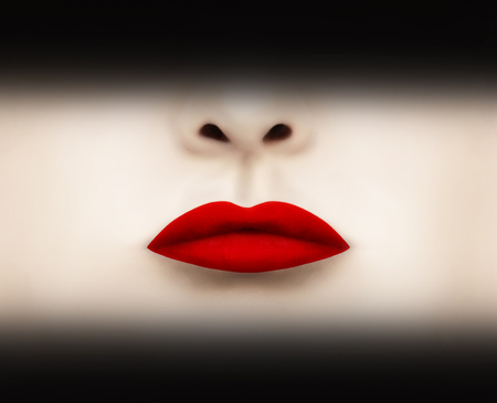 Beautiful red scarlet lips highlighted with black shadow above and belowの写真素材