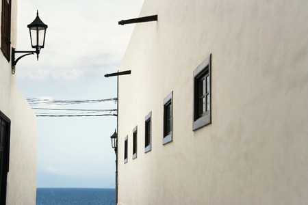 Beautiful architectural glimpse with the ocean in the background in Garachico, Tenerife, Canary Islandsの写真素材