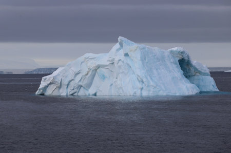 Beautiful white iceberg floating in the ocean in Antarcticaの写真素材