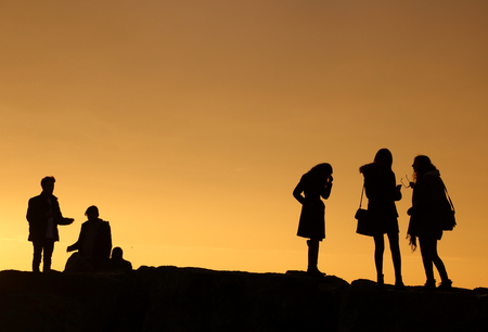 silhouettes of peopleの写真素材